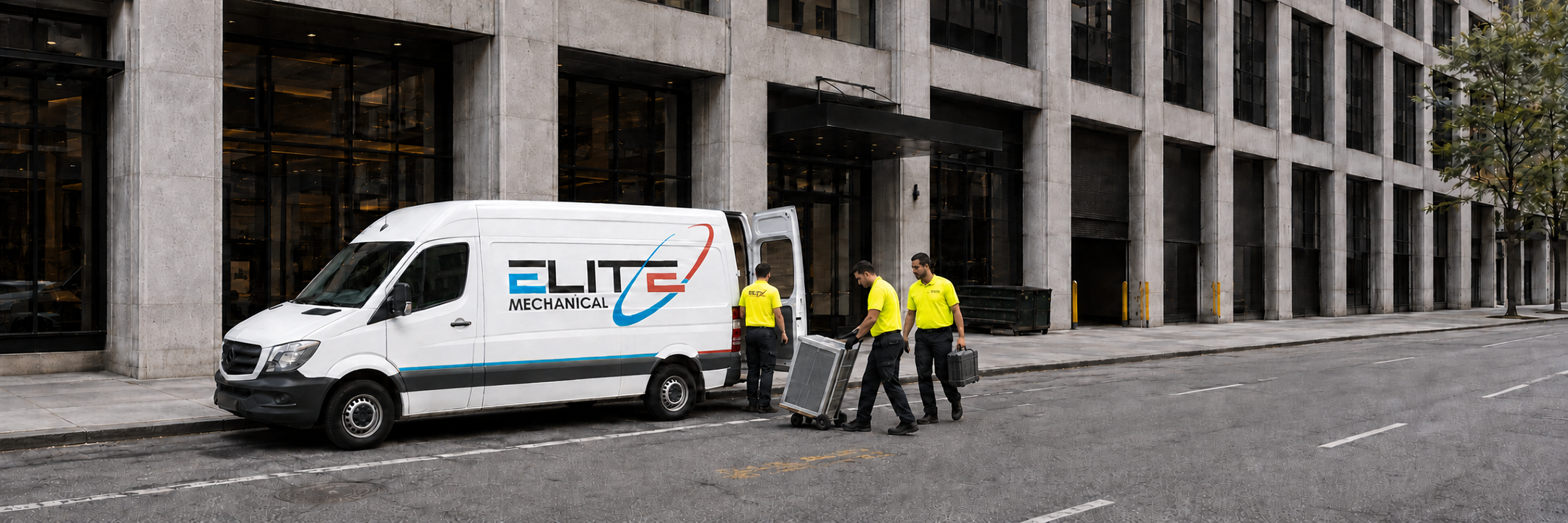 Elite Mechanical service van outside a New York City commercial building
